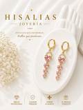 Arete con cristales en figura de corazón y color rosado